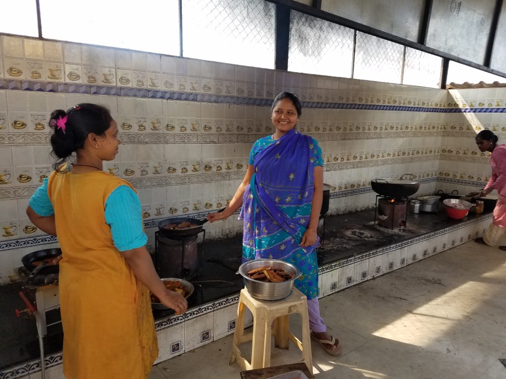 All the food for the old people's home where we are having the priest retreat in Pune is being cooked under wood burning fires outbuilding