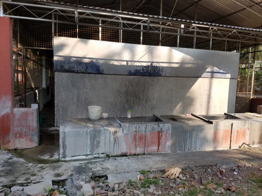 All the laundry at the retreat house is done by beating the clothes on the cement slab